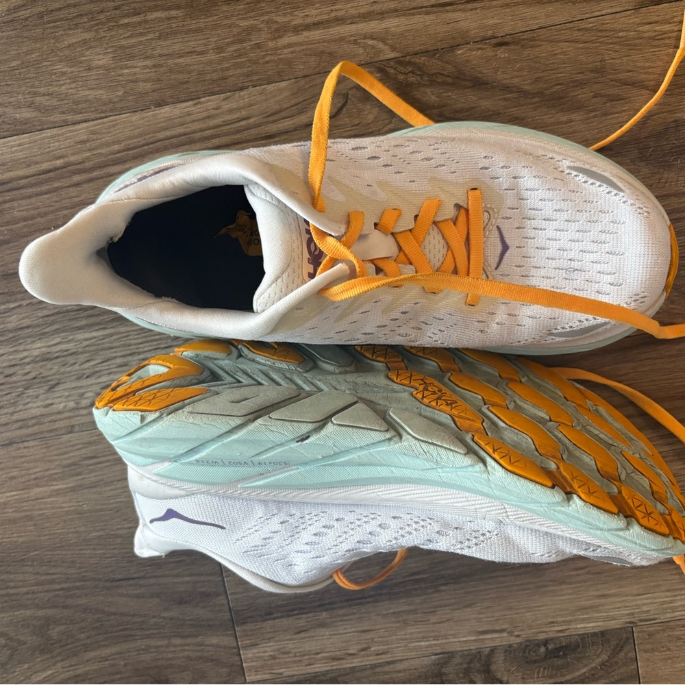 Hoka White and Orange Athletic Shoes